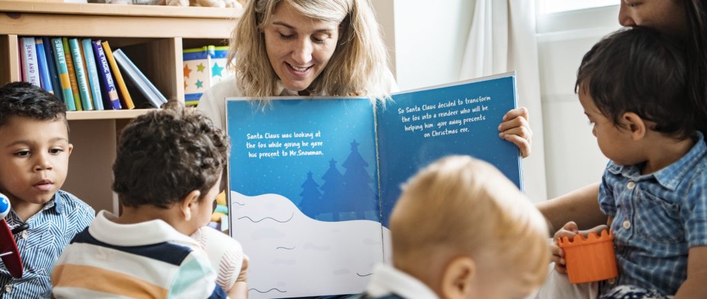 nursery staff showing early years practitioner skills