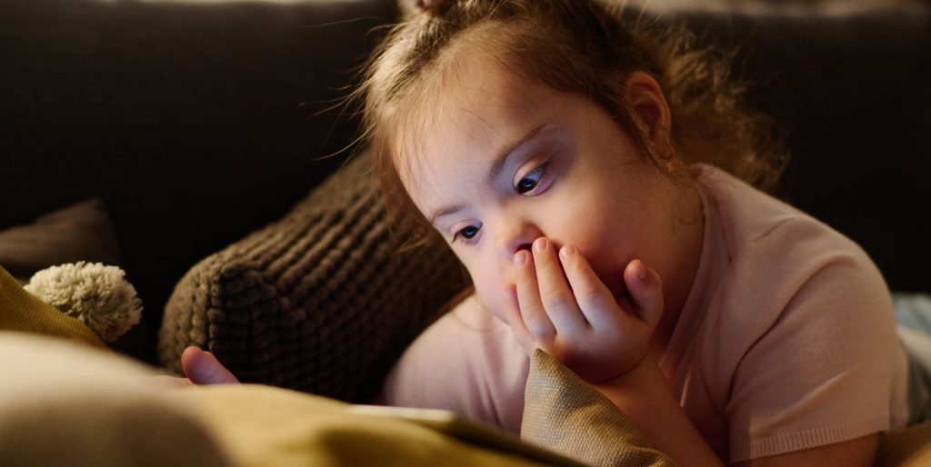 child enjoying quiet time to illustrate accessibility in early years education